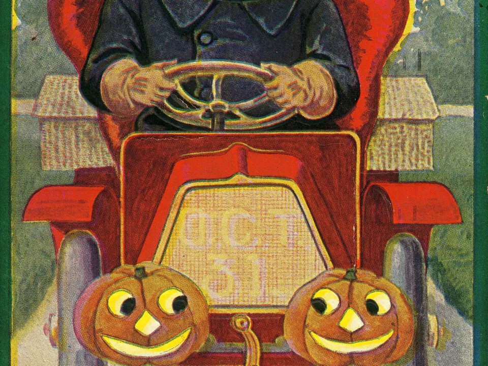 Photo for Postcard: “You Auto Have a Happy Hallowe’en.” (Jack-o’-lantern driving a car)